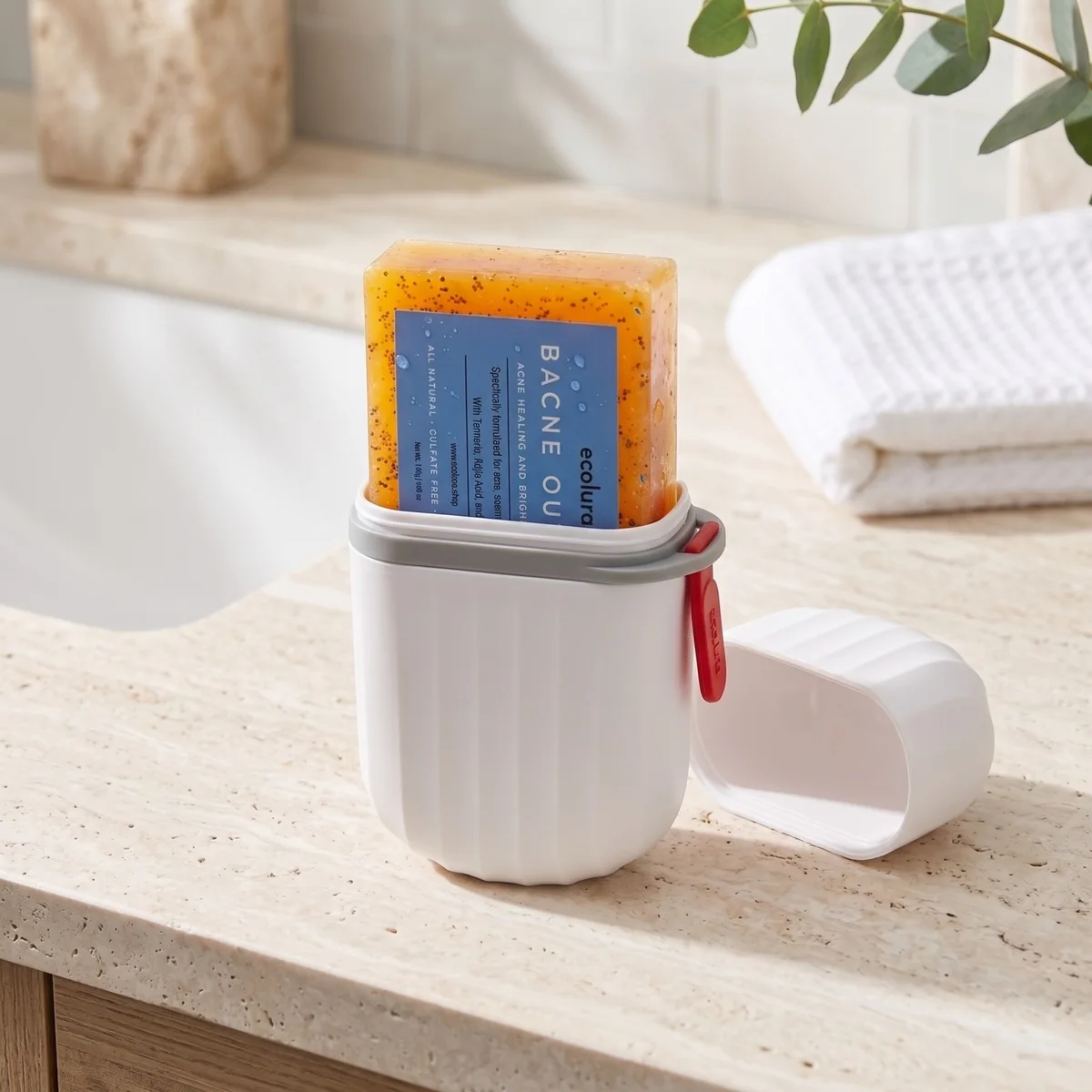 Bacne Out Bar standing in the open white soap case, cap beside it